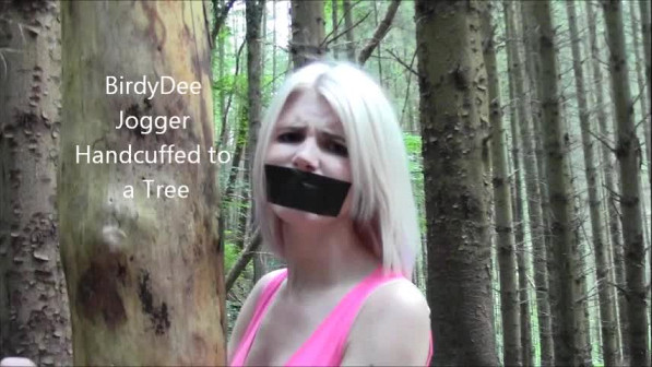 Birdy Dee Jogger Handcuffed To a tree