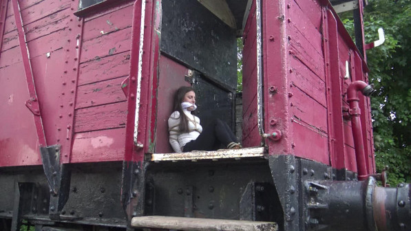 Lola Xr Tied up in The Railway Car